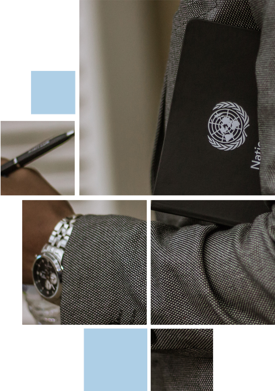 UN Member holding UN branded notebook.